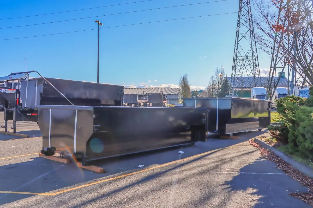 Roll-off dumpster ready for waste disposal at job site for 15 Yard Dumpster Rental in Manistee
